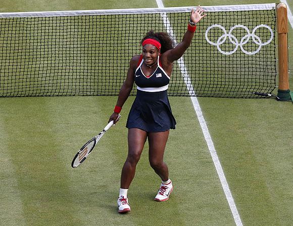 Serena Williams of the US celebrates after defeating Belarus' Victoria Azarenka in their women's singles tennis semi-final match on Friday