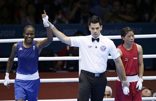 Great Britain's Nicola Adams, left, and India's MC Mary Kom