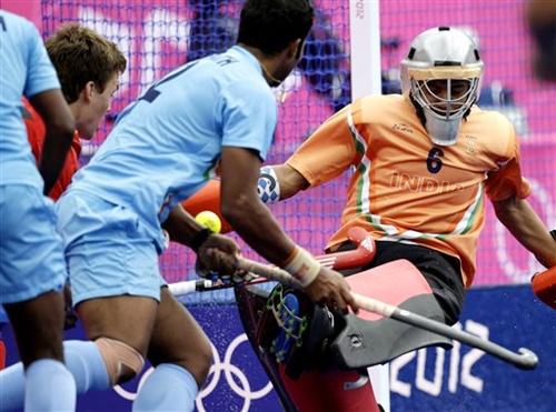 India goalkeeper Bharat Chetri can't stop a goal by Belgium's Tom Boon