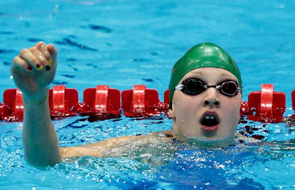 Lithuania's Ruta Meilutyte reacts after competing in the Women's 100m Breaststroke