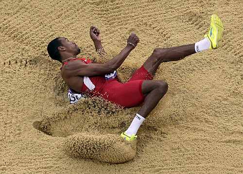United States' Christian Taylor takes a jump during the men's triple jump final in the Olympic Stadium