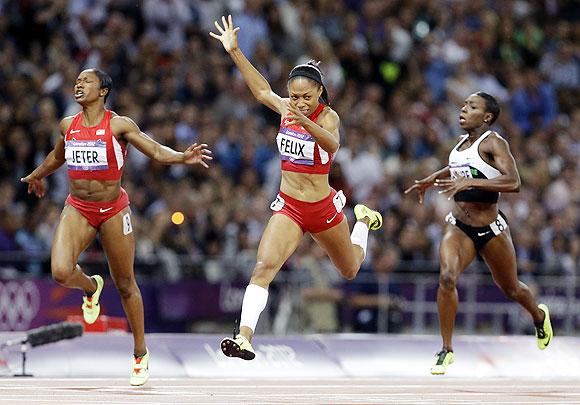 United States' Allyson Felix crosses the finish line to win the women's 200-meters final on Wednesday