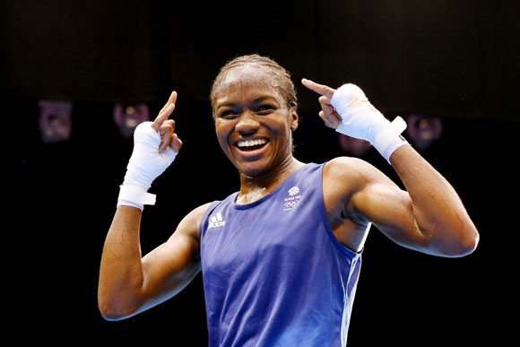 Nicola Adams of Great Britain celebrates winning her bout against Cancan Ren   of China during the Women's Fly (51kg) Boxing final bout