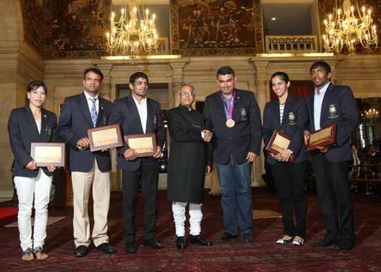 Pranab Mukherjee with the Olympic medal winners