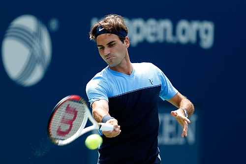 Roger Federer of Switzerland practices prior to the start of the 2012 U.S. Open at the USTA Billie Jean King National Tennis Center