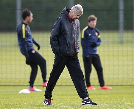 Arsene Wenger during a training session on Monday