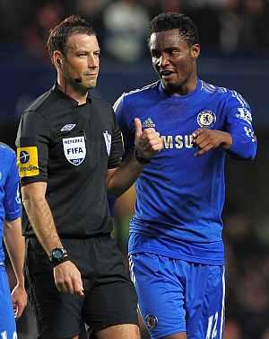 John Obi Mikel talks to ref Mark Clattenburg