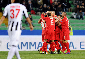 Jordan Henderson of Liverpool celebrates with teammates after scoring against Udinese during their UEFA Europa League Group A match on Thursday