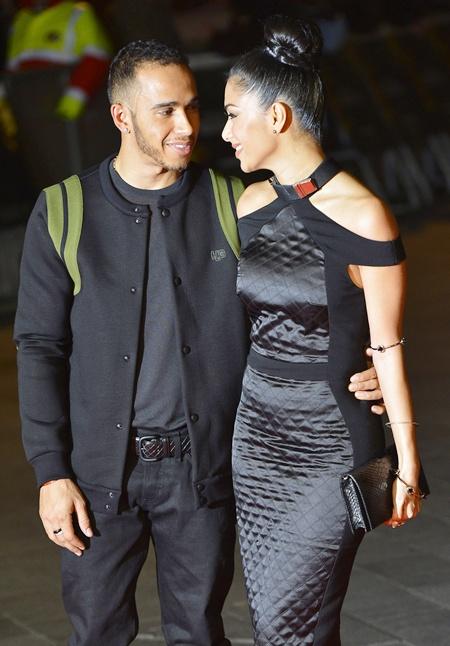 US singer Nicole Scherzinger (right) and British Formula One racing driver Lewis Hamilton