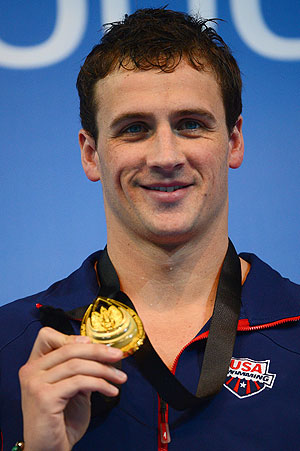 Ryan Lochte of USA poses with his Gold medal after winning the Men's 100m Individual Medley Final during day five of the 11th FINA Short Course World Championships on Sunday