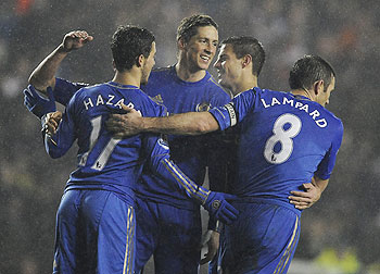 Chelsea's Fernando Torres (centre) celebrates with teammates after scoring during their English League Cup quarter-final against Leeds United on Wednesday