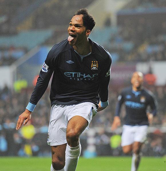 Joleon Lescott of Man City celebrates after scoring against Aston Villa on Sunday