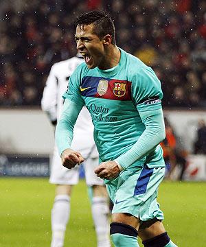 Barcelona's Alexis Sanchez celebrates a goal against Bayer Leverkusen during their Champions League match in Leverkusen on Tuesday