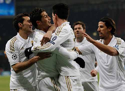 Real Madrid's Cristiano Ronaldo celebrates with teammates after scoring during the UEFA Champions League round of 16, first leg match against CSKA Moscow
