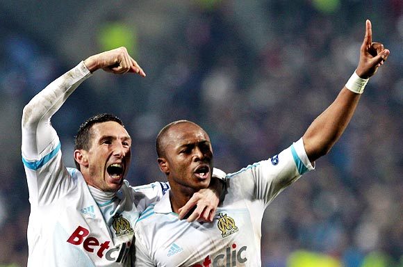 Olympic Marseille's Andre Ayew (right) celebrates with team-mate Morgan Amalfitano after scoring against Inter Milan