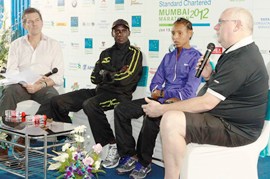 Elite athletes' co-ordinator Tim Hutchins, Kenya's William Kipsang, Ethiopia's Fatuma Sado and Ian Ladbroke in Mumbai on Thursday