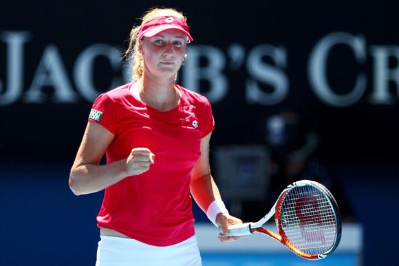 Ekaterina Makarova of Russia celebrates a point in her fourth round match against Serena Williams of the United States of America