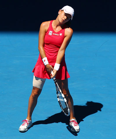 Agnieszka Radwanska of Poland reacts in her quarter final match against Victoria Azarenka of Belarus during day nine of the 2012 Australian Open at Melbourne Park