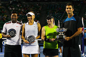 Runners up Leander Paes of India, Elena Vesnina of Russia and winners Horia Tecau of Romania and Bethanie Mattek-Sands of the United States of America pose on the podium for the mixed doubles final