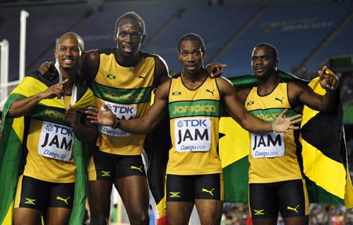 (Left to right): Nesta Carter, Michael Frater, Yohan Blake and Usain Bolt