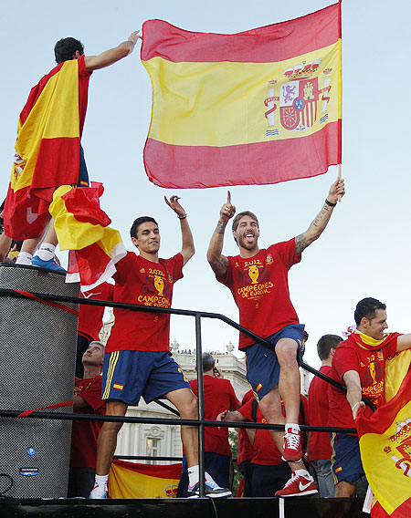 Spain's national soccer team players Sergio Ramos (right) and Jesus Navas celebrate