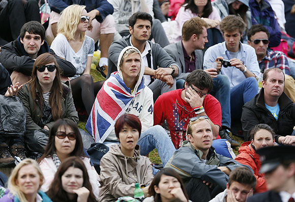 The crowd on Murray Mount react after Andy Murray's Wimbledon final loss to Roger Federer  on Sunday