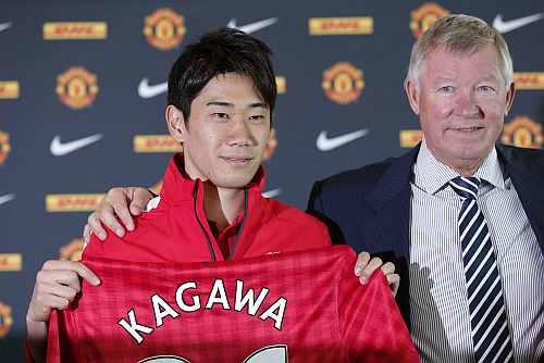 Manchester United's new signing Shinji Kagawa of Japan attends a news conference at Old Trafford stadium in Manchester