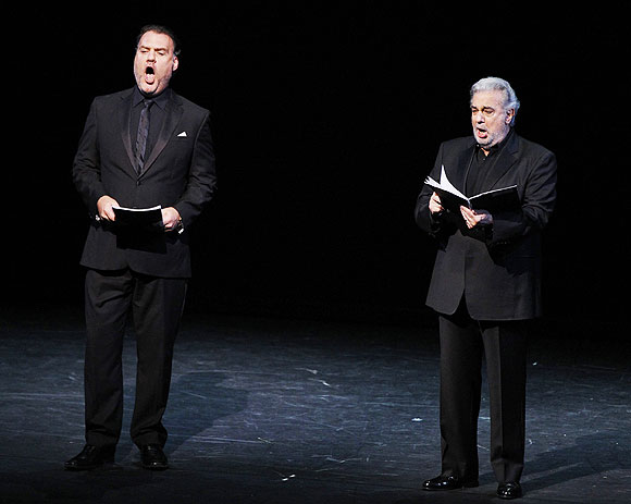 Opera singers Bryn Terfel (left) and Placido Domingo perform on stage during the opening ceremony of the International Olympic Committee session at London's Royal Opera House, on Monday