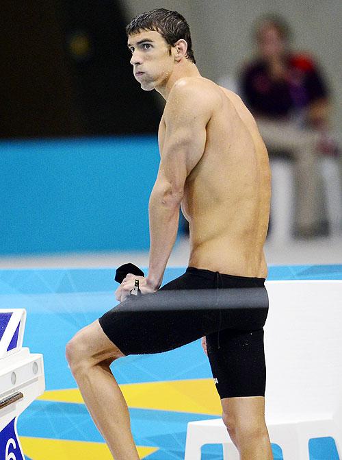 Michael Phelps of the United States reacts after his team won the silver medal in the men's 4x100-meter freestyle relay final at the Aquatics Centreon Sunday