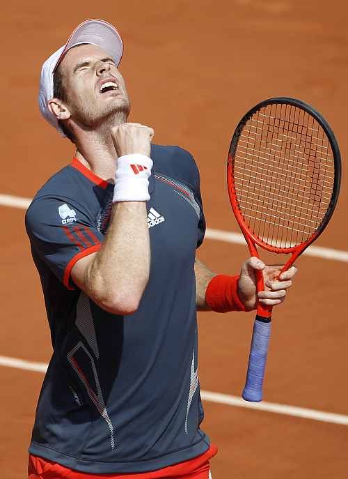 Andy Murray of Britain reacts after winning his match against Giraldo of Colombia during the French Open