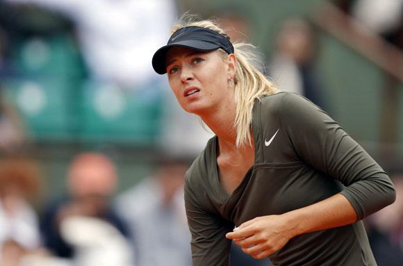 Maria Sharapova of Russia reacts during her match against Klara Zakopalova of the Czech Republic during the French Open tennis tournament at the Roland Garros stadium in Paris