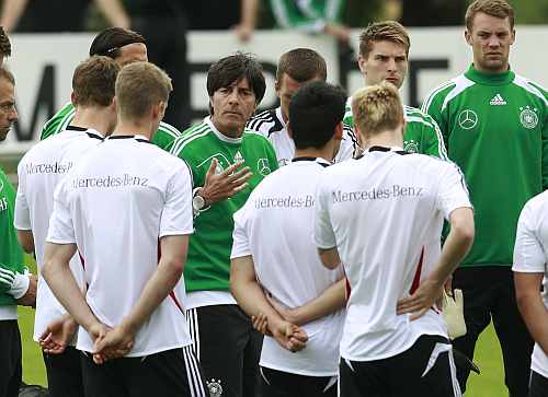 Germany's national soccer coach Joachim Loew gestures during an official training session ahead of the Euro 2012