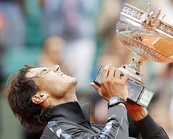 Rafael Nadal of Spain holds the trophy
