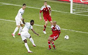 Portugal's Silvestre Varela (2nd from left) scores the winner against Denmark during their Group B match