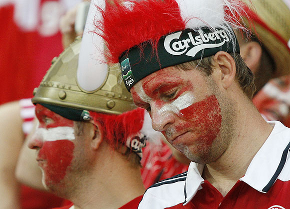 Denmark fans react at the end of their match against Portugal