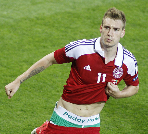 Denmark's Nicklas Bendtner reacts after scoring against Portugal