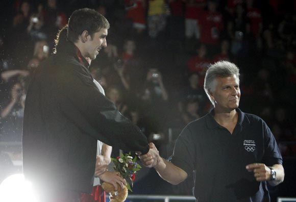 Mark Spitz (right) with Michael Phelps