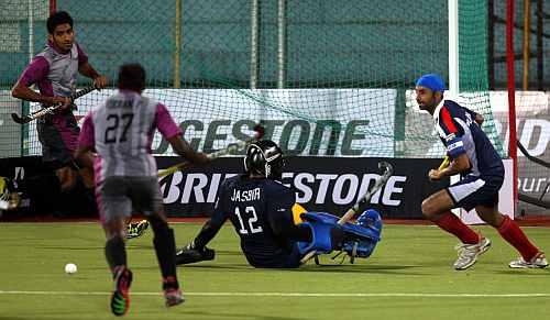 Prabjot Singh celebrates after scoring