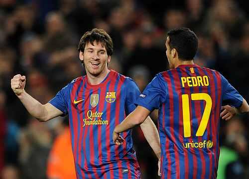 Lionel Messi celebrates after scoring against Bayer Leverkusen