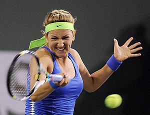 Victoria Azarenka of Belarus hits a backhand during her 6-4, 6-3 semi-final win over Angelique Kerber of Germany