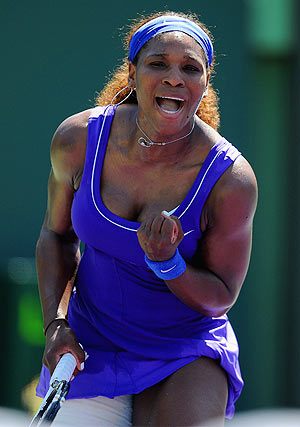 Serena Williams of the USA celebrates winning her match against Shuai Zhang of China