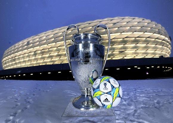 The UEFA Champions League trophy and the official match ball for the final