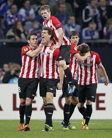 Athletic Bilbao's Fernando Llorente (C) celebrates his goal against Schalke 04 during their Europa League first leg quarter-final soccer match in Gelsenkirchen