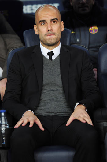 Head coach Josep Guardiola of FC Barcelona looks on during the UEFA Champions League Semi Final, second leg match between FC Barcelona and Chelsea FC at Camp Nou