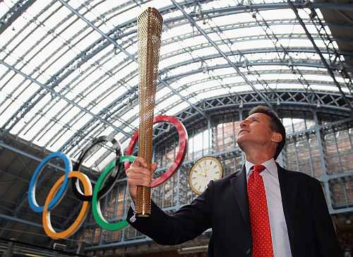 Sebastian Coe with the Olympic torch