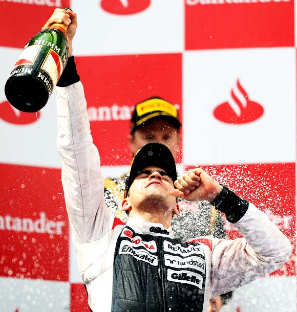 Pastor Maldonado celebrates winning the Spanish Grand Prix