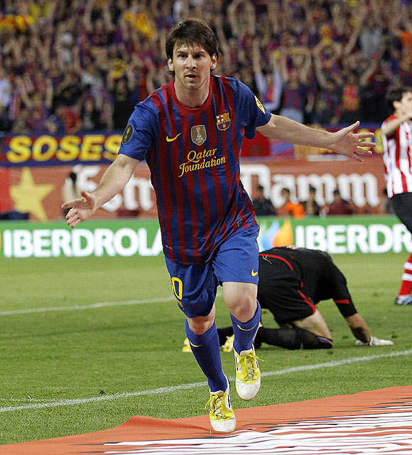 Lionel Messi celebrates after scoring Barcelona's second goal