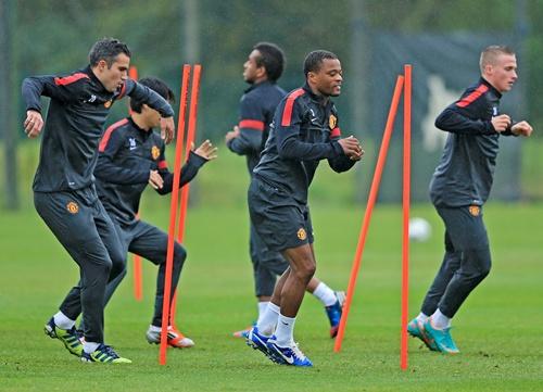 Robin Van Persie, Patrice Evra and Tom Cleverley practise