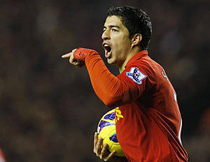 Liverpool's Luis Suarez celebrates after scoring during their English Premier League soccer match against Newcastle United on Sunday