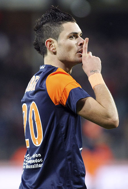 Montpellier's Remy Cabella reacts after scoring against Paris St Germain during their French Ligue 1 match